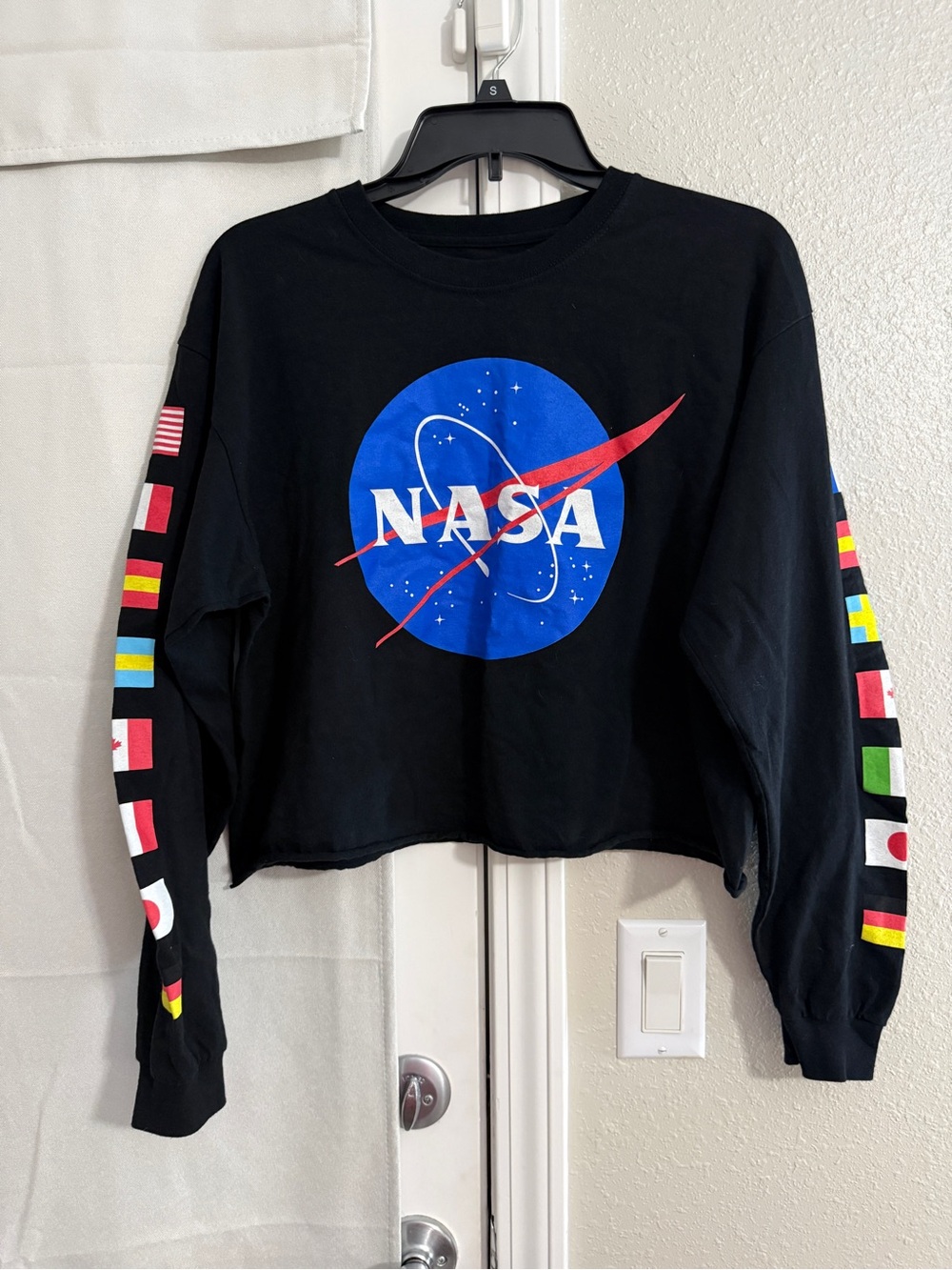 Chemistry Black Crop Sweatshirt with Blue NASA Logo and Multicolor Sleeve Flags